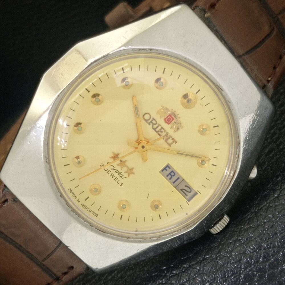 Vintage 1976 Orient Automatic Mens Silver Watch W/daydate & Gold accents